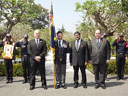 Graham Macdonald the president of the Royal British Legion Thailand with standard bearer  Richard Holmes, the British Ambassador and Bert Elson.
