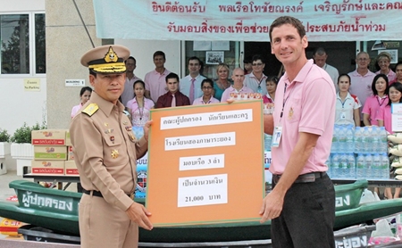Mr. Prakong and Mr. Goldsack handed out donations to the general.