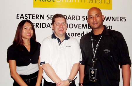 The president and main sponsors (L to R) Sarinya Holloway, sales and marketing manager for Strategic Airlines; AustCham President John Anderson; and Ian Sutedjo, director of sales and marketing for Hard Rock Hotel Pattaya.