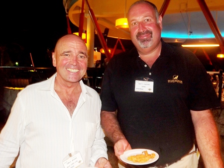 Carey Archer from Gold Coast Web and Scott Finsten from OMYC tuck into the great food put on by Hard Rock.
