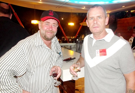 Mel Hand and Jon Fox from Q Cars Thailand aren’t debating beer and wine, but white and red.