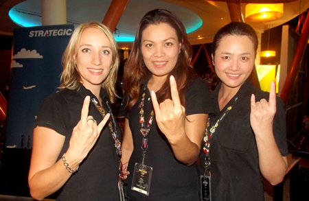 Svetlana, Jum and Nok from Hard Rock Hotel signal their enduring friendship.