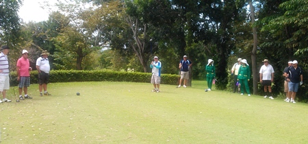 Sugar, playing for the Outback Bar, fiddles one off the tee at Phoenix.
