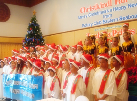 The adorable Pattaya Orphanage Choir performs superbly.