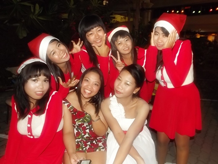 Santa’s helpers visit some honored guests at Jomtien Garden Hotel.