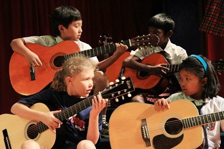 The “Craze” guitarists playing an original music piece.