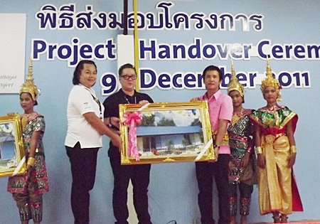 Ekawat Usaneepan, deputy director of the Region 3 Office of Education (3rd right) officially accepts the renovations from Jorge Carlos Smith, general manager of Hard Rock Hotel Pattaya.