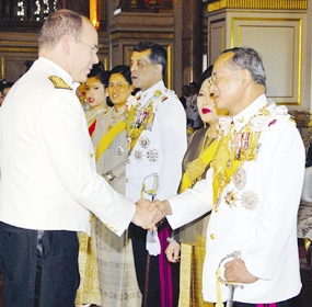 His Majesty the King is congratulated by Monaco Prince Albert II as HM Queen Sirikit looks on at the Ananda Samakhom Throne Hall in Bangkok Monday, June 12, 2006. 