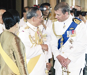 His Majesty the King and HM Queen Sirikit speak with Britain’s Prince Andrew during a celebration in Bangkok Monday, June 12, 2006.