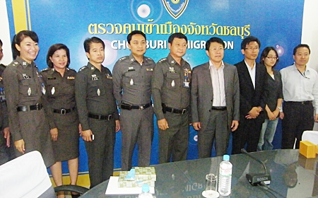 Korean Immigration officials (1st-4th right) meet with Chonburi Immigration officials in Jomtien. 