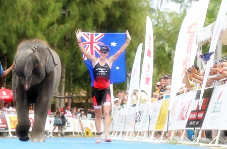 Reigning Ironman 70.3 World Champion Melissa Rollison of Australia celebrates her victory at Laguna Phuket in the Ironman 70.3 Asia- Pacific Championship.