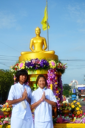 Dressed in white, praying for peace, reaching for serenity.