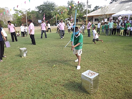Playing traditional Thai games at the Banglamung Home for Boys.