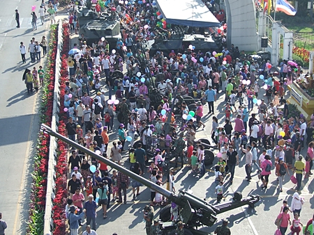Thousands of children and their families create a busy atmosphere in front of Pattaya City Hall.