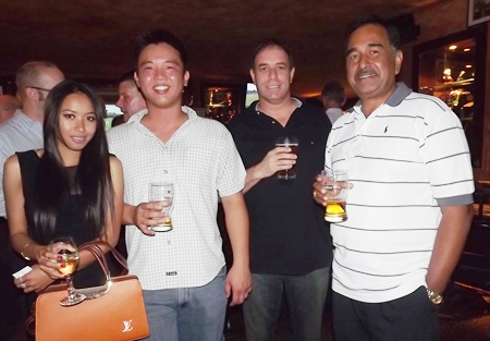 Jitra Wongjuan (AA Insurance Brokers) poses for a photo with Adrian Sii, Ken Bright and Ray D’Silva, the Bosch Chassis Systems trio.