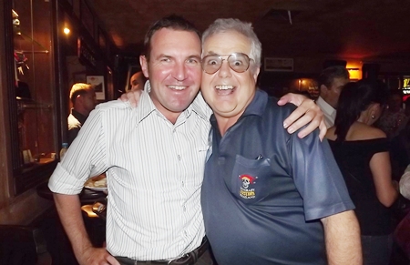 Paul Wilkinson hugs Kim Fletcher, the adoring landlord of Jameson’s.