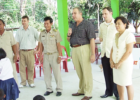 Rene Pisters, flanked by hotel staff and school administrators, addresses the gathering, offering heart felt assistance. 
