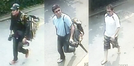 In this combination of images made from surveillance video on Tuesday, Feb. 14, 2012, three Iranian bomb suspects, identified by police from left, as Saeid Moradi, Mohammad Kharzei and Masoud Sedaghatzadeh, walk down the middle of a residential street in Bangkok after the first blast at an explosives-filled house where the three were staying. (AP Photo/Spokesman Office of National Thai Police) 
