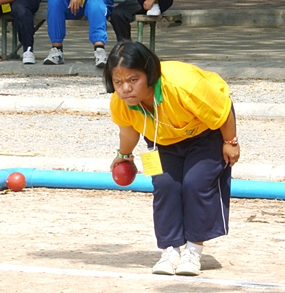Pancake is full of concentration on her way to winning the bocce ball competition.