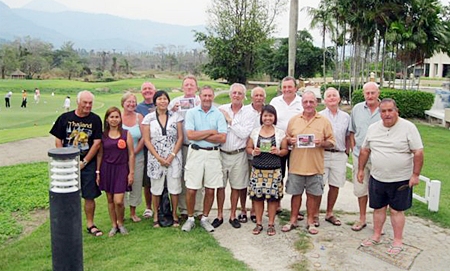 Royal Hills road trip golfers pose with wives and girlfriends for a group photo. 