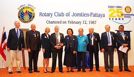 Past and future Presidents of the Rotary Club of Jomtien-Pattaya line up for a photograph. (l-r) Dieter Reigber, Jan Abbink, Judy Hoppe, Gudmund Eiksund, Alvi Sinthuvanik, Premprecha Dibbayawan, Dennis Stark, Max Rommel and Peter Malhotra.