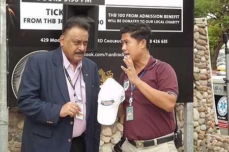 PDG Peter Malhotra and Pol.Lt.Col. Jirawat Sukonthasap, Head of the City Hall Security & Safety Services, discuss the precautionary measures taken to ensure the safety of swimmers and guests both on and off shore.