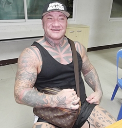 New Zealand wrestler Timothy John Ward was charged with assault over a fight with a Canadian who dissed him over his tattoos. 