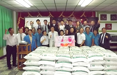 South Korean and Thai Rotarians donate fifty 60-kg bags of rice to the Father Ray Foundation’s S.O.S. Rice campaign.