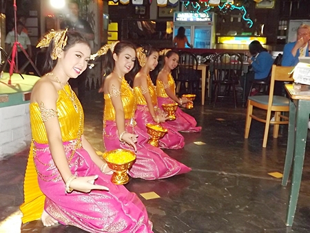 Beautiful Thai dancers give a cultural performance for the guests at the Green Tree Pub.