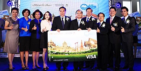 Representatives from the TAT and Krungthai Bank, as well as the director of the Association of Thai Travel Agents (ATTA) and other partner organizations pose for posterity at the MOU signing ceremony. 