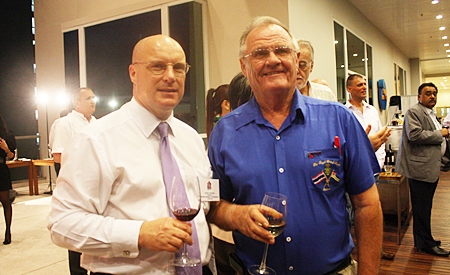 (L to R) David Cumming, general manager of Amari Orchid Resort & Tower, Pattaya chats with Derek Brook, chairman of the Royal British Legion Chonburi Thailand Branch.