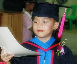 One of the many youngsters who received their graduation certificates.
