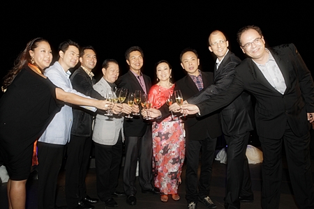 (L-R) Supichaya Suracupt, Director of Social Affairs & Publicity, CPN; MP Poramase Ngampiches, Itthiphol Kunplome, acting Pattaya City mayor; MP Sansak Ngampiches; Naris Choeyklin, Senior EVP & CFO, CPN; Wallaya Chirathivat, Senior EVP-BD & Construction Management, CPN; Dr. Nattakit Tangpoonsinthana, Executive VP – Marketing, CPN, Harald Feurstein, General Manager, Hilton Pattaya and Thomas Hoeborn, GM, Millennium Hilton BKK & Regional GM-Thailand toast to the opening of Horizon, May 26, 2012.