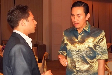 Karan Khanijou (left), vice president in charge of investment sales for Jones Lang LaSalle Hotels, chats with Saksit Potisit, spokesman for City Hall.
