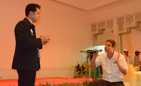 Uli Kaiser from Automotive Manufacturing Solutions poses a question for Mayor Itthiphol Kunplome.