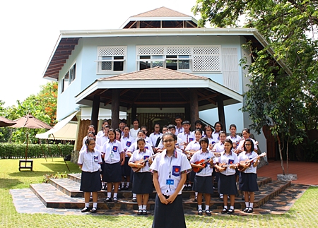 The “biggest ukulele band in Thailand” performs for the honored guests in front of the new school.
