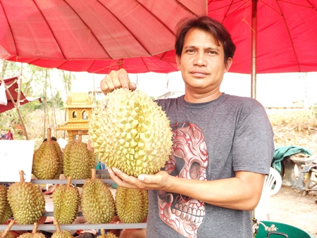 Vendor Direk Khaewdum sells his durian at the Hollywood three-way intersection in North Pattaya. 