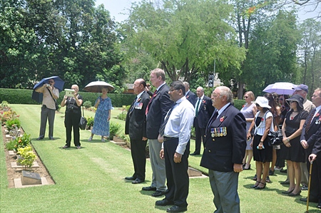 The Wreath Layers at Chungkai (from right) Maurice Hewson, the British Ambassador, Tony Archer and Fred Beavis.