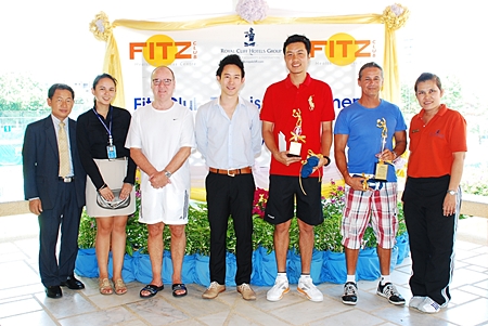 Winners of the first Fitz Club tennis tournament are presented with their trophies. 