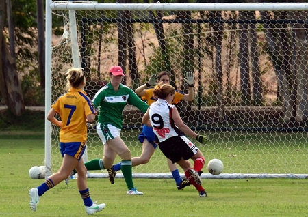 Singapore open the scoring in the ladies final against Malaysia.