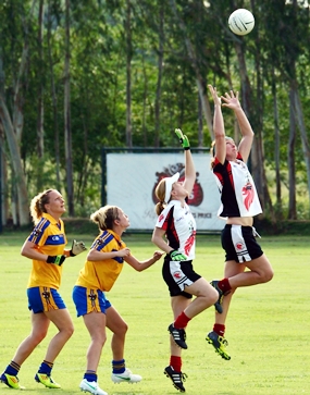 Challenging for the ball at the restart.