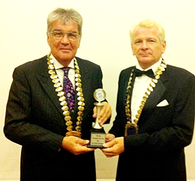 Dale Lawrence (left) and Andrew Wood pose with the award. 