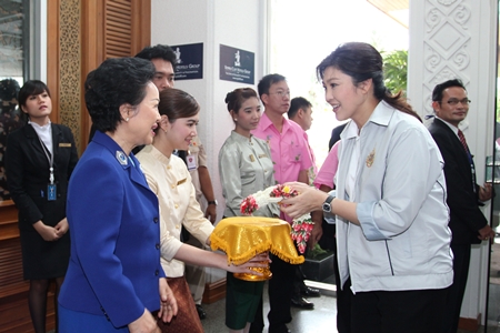 Panga Vathanakul (left), Managing Director of Royal Cliff Hotels Group welcomes Prime Minister Yingluck Shinawatra and her cabinet upon their arrival at the hotel for the 5th Mobile Cabinet Meeting, held on June 17-19. Panga Vathanakul proudly said, “It is certainly a privilege to be part of such an important occasion. We are elated to have had this opportunity to have looked after our nation’s leaders.”
