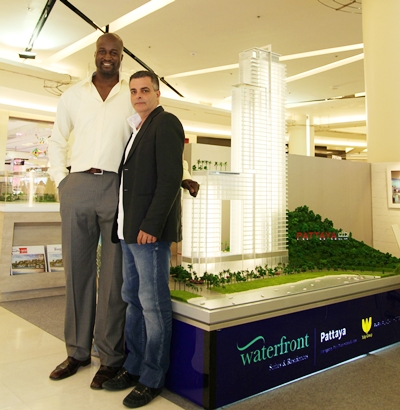 Former LA Lakers basketball star Ike Nwankwo (left) recently visited the Tulip Group’s Waterfront Suites & Residences booth which formed part of the Siam Paragon Luxury Property Expo held in Bangkok from May 10-20.  The 6ft 11 inch NBA star, who has been working in Thailand for the past couple of years with his basketball training academy for youngsters, showed a keen interest Pattaya’s latest tall development which is already proving to be a slam dunk for the Tulip Group and its CEO, Kobi Elbaz (right).  As of the beginning of May the Waterfront had sold out 60% of its units.