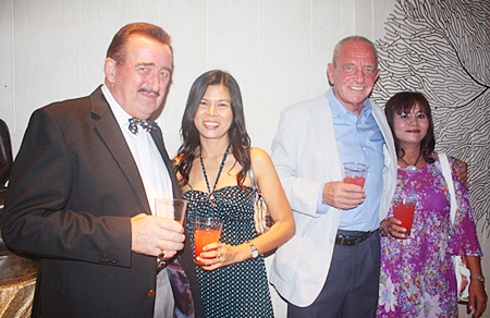 John Collingbourne and Yada Ruairuen from Collingbourne Auctioneers, toast with Roger Mynott, owner of Thai Decor Company and Somnuk Tunkratok.