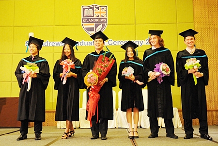 The students receive a round of applause at the formal graduation ceremony.
