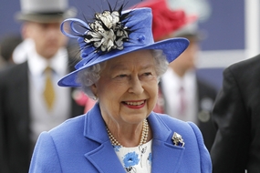 Britain’s Queen Elizabeth II arrives for the Epsom Derby at Epsom race course, southern England at the start of a four-day Diamond Jubilee celebration to mark the 60th anniversary of the Queen’s accession to the throne Saturday, June 2. (AP Photo/Sang Tan)