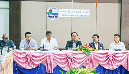 Banglamung’s district chief Chawalit Saeng-Uthai (3rd left) addresses the Pattaya Business & Tourism Association. 