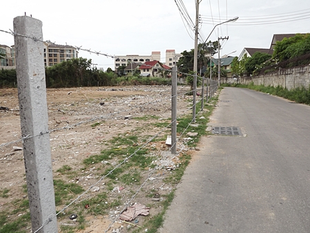 After the city finally cleaned up this area, which had been used as a free-for-all garbage dump for over a year, the owner put up a barbed wire fence to make sure it doesn’t happen again. 