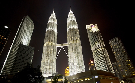 Malaysia’s landmark Petronas Twin Towers are shown in the capital Kuala Lumpur.  The nation’s major property developers have been buying up large land parcels despite signs of a cooling real estate sector. EPA/Ahmad Yusni 